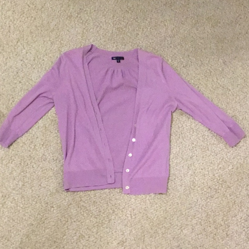 Woman’s purple Cardigan